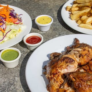 1/2 Pollo Con Dos Combinaciones